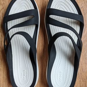 Black and white Crocs Swiftwater sandals